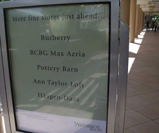 Sign with stores at Waterside Shops Mall in Naples Florida